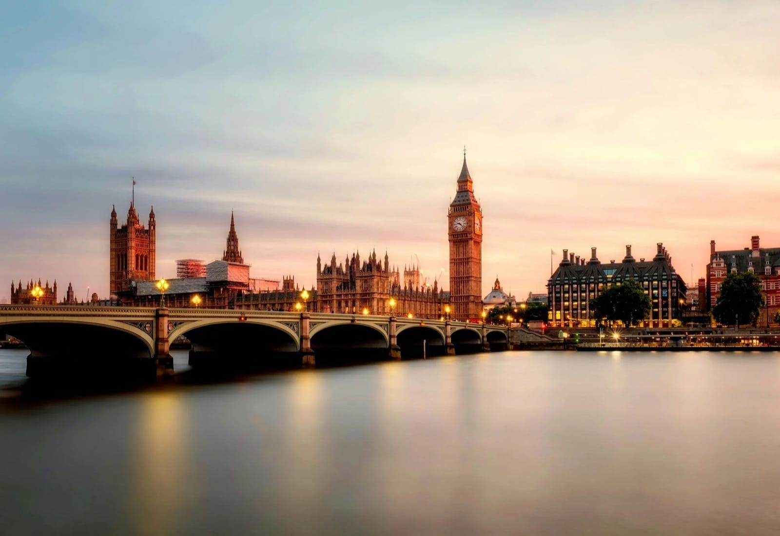 London skyline at dusk viewed from a rooftop bar